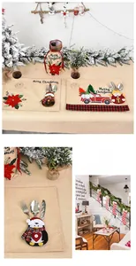 Christmas dining set with Santa penguin cutlery holders and festive burlap placemats