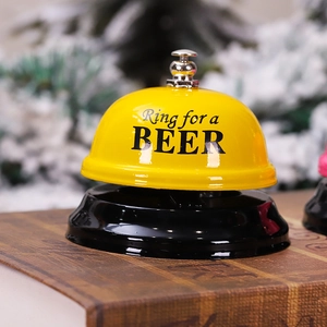 Manual metal service bell in yellow and black with 'Ring for a BEER' text print