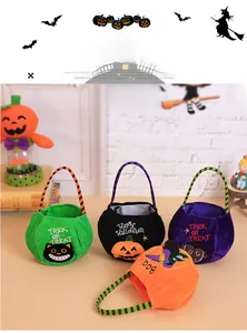 Close-up of Halloween plush candy bags featuring creative ghost and pumpkin character designs