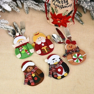 5-pack Christmas cutlery holders featuring Santa elf bear and penguin dining decor