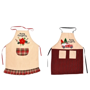 Christmas linen aprons with Merry Christmas text, red truck, and plaid ruffle hem
