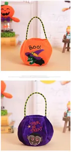 Detail of plush Halloween candy bags with Boo and Trick or Treat embroidery decorations
