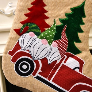 Christmas burlap stocking with sequined gnomes and red truck embroidery decoration