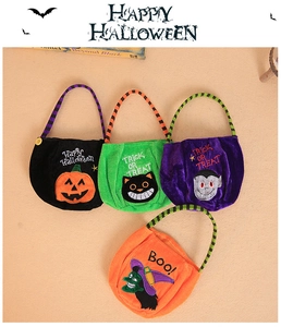 Set of four plush Halloween candy bags with pumpkin, ghost, and cat character designs