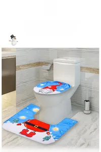 Blue Christmas bathroom set with gnome and tree patterns on toilet cover and floor mat