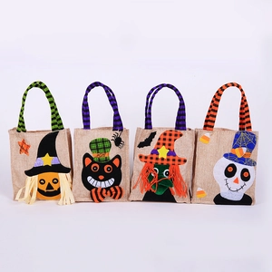 Set of 4 burlap Halloween candy bags with pumpkin, cat, witch, and skull felt appliques