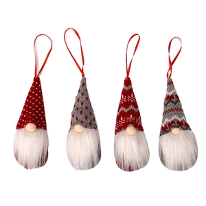 Set of four knitted Christmas gnomes with long beards and hanging cords for tree decor