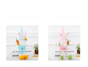 Detail of pink and blue Easter long-leg gnomes with bunny ears holding carrots
