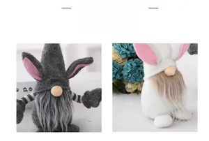 Detail of Easter gnomes with rabbit ears in grey and white plush fabric for home decor