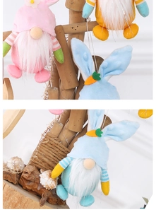 Detail of colorful Easter bunny gnomes with carrot hats and soft white beards for decor