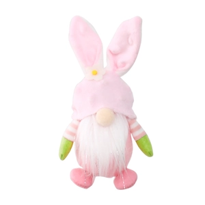 Pink Easter gnome plush with bunny ears and flower detail on a white background