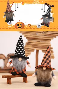 Detail of Halloween gnome plush dolls with black and orange patterned hats on wooden stools
