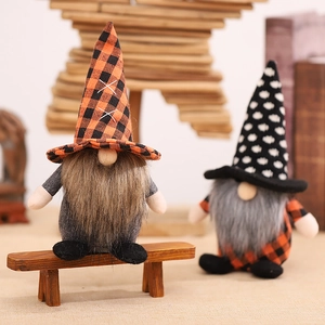 Halloween gnomes plush ornaments with pointed hats on a wooden bench home decor