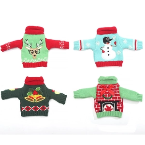 Set of 4 Christmas knit mini sweaters with reindeer and snowman designs for wine bottles