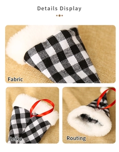 Detail view of black and white plaid Christmas hat ornaments with plush trim and red lanyard