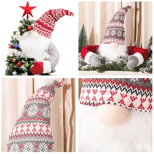 Charming knitted Christmas gnome tree topper with snowflake patterns and white beard