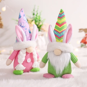 Easter gnome plush set with rabbit ears and colorful hats on a soft white background
