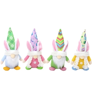 Set of four colorful Easter Gnomes with rabbit ear hats for festive holiday decoration