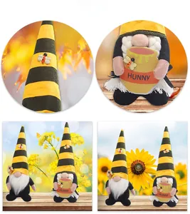 Close-up of handmade bee gnome plush decor featuring honey pot and sunflower details