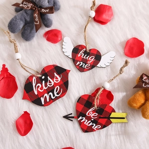 Valentine's wooden heart ornaments with red buffalo plaid design and romantic quotes