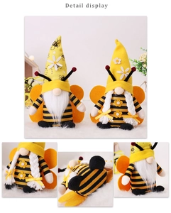 Detailed view of handmade bee gnomes with striped hats, wings, and floral accents