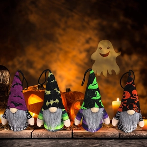 Set of four Halloween gnomes with skull hats and beards for party hanging decorations