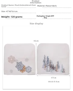 Detailed view of white plush Christmas chair covers with embroidered snowflake pattern