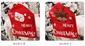 Detail of red snowman and reindeer Christmas chair covers with festive embroidery art