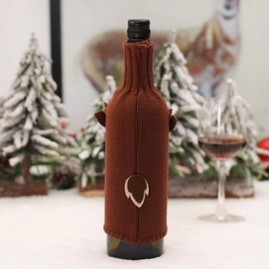 Brown knitted reindeer wine bottle cover for Christmas holiday table decorations
