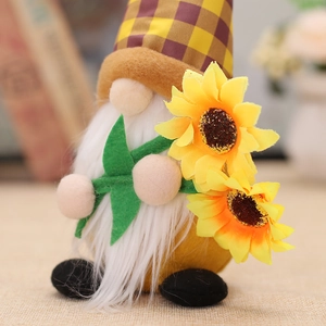 Harvest festival gnome plush with yellow checkered hat and vibrant sunflowers
