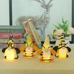 Set of four glowing bee gnome ornaments with LED lights for home festive decoration