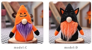 Detail of Halloween gnome plush dolls with pumpkin and cat ear hats on wooden display