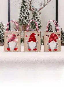 Three-piece burlap Christmas gift bags featuring gnomes and striped handles on snow background