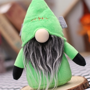 Halloween Frankenstein gnome plush with green face and grey beard on wooden base