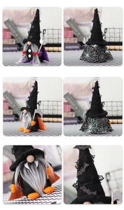 Close-up details of Halloween gnome dolls with wizard capes and bat lace decorations