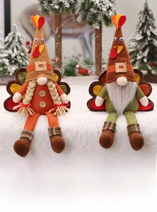 Detail of harvest festival turkey gnomes with autumn colors and soft plush textures