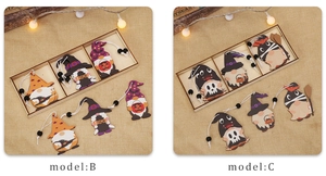Detail of wooden Halloween gnome pendants featuring models B and C with festive patterns