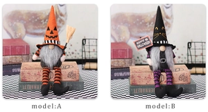 Detail of Halloween gnome plush dolls with pumpkin hats and Happy Halloween signs