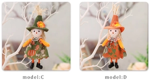 Detail of harvest festival scarecrow dolls with daisy hats and autumn pumpkin patterns