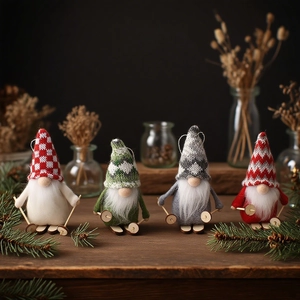Detail of four handmade Nordic Christmas gnomes with knitted hats and wooden skis