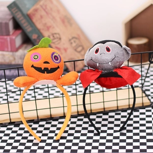 Halloween headband set featuring plush pumpkin and vampire designs for party decorations