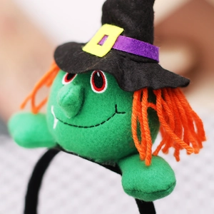 Halloween headband featuring a green witch with orange hair and black pointed wizard hat