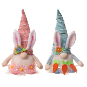 Easter bunny gnome plush set with glowing light and carrot decorations on white background