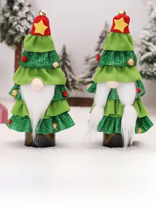 Detail view of gnome Christmas tree wine bottle covers with gnome beard and red hats