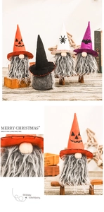 Detail of handmade Halloween gnome with orange pumpkin hat and long grey beard
