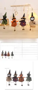 Detail of Halloween gnome pendants with pumpkin and cat themes in rustic burlap fabric