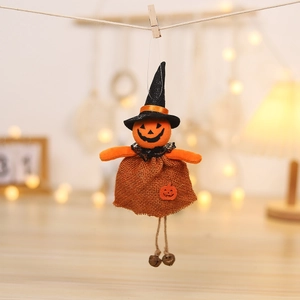Hanging Halloween burlap pumpkin wizard doll decoration with bell legs on a rustic twine