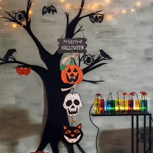 Hanging wooden Halloween decoration featuring pumpkin, skull, and black cat ornaments