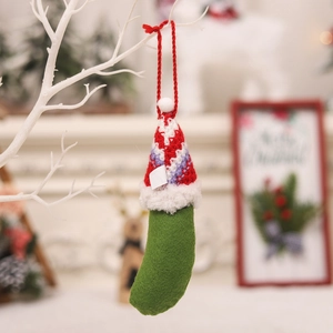 Handmade green felt banana Santa Claus Christmas tree ornament with a red knitted hat