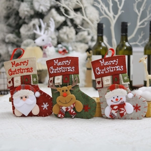 Three Christmas stockings with 3D Santa, reindeer, and snowman icons for holiday decor